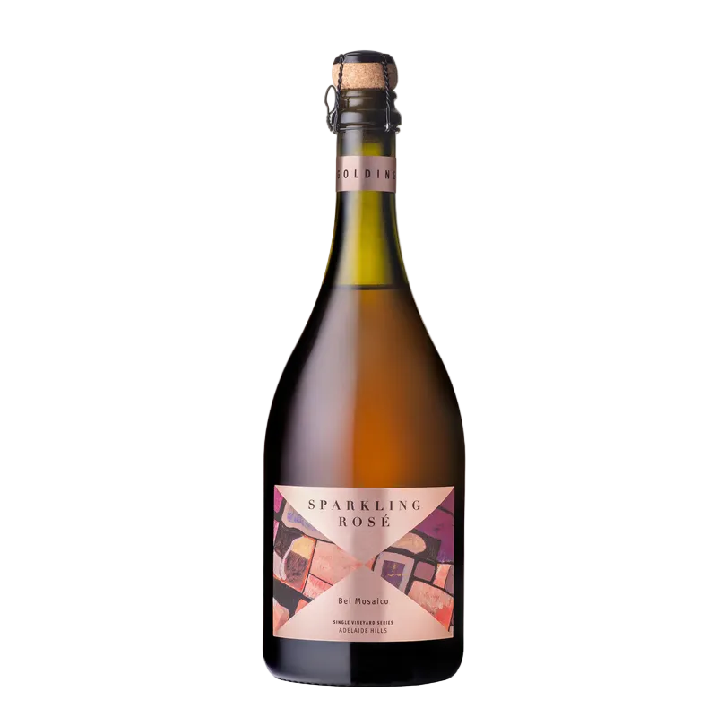 A bottle of Goldin Sparkling Rose non-alcoholic sparkling wine, featuring a dark amber glass bottle, a pink and beige label, and a cork closure, set against a plain white background.
